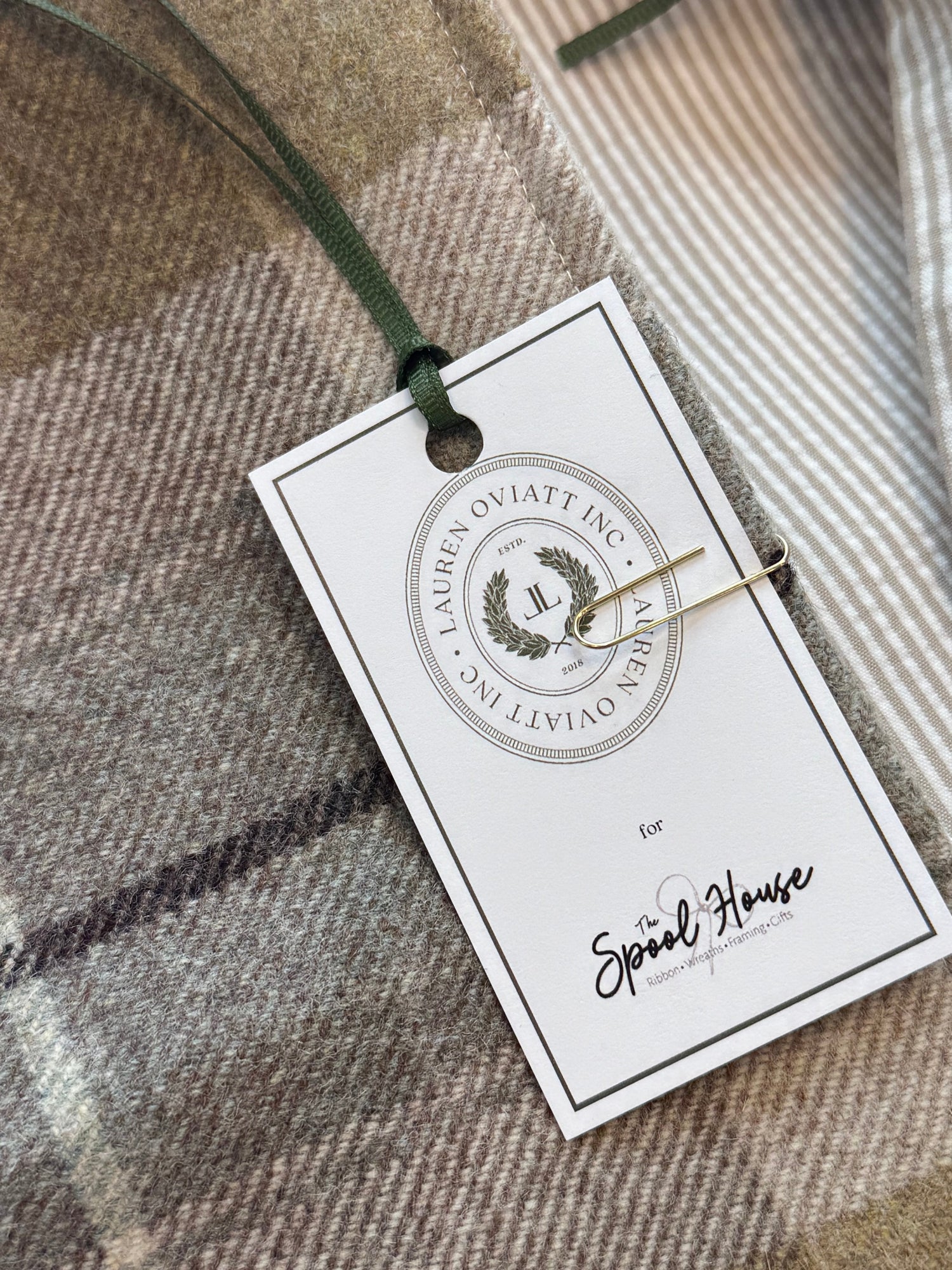 Lauren Oviatt displaying her beautiful fall collab pieces for The Spool House.